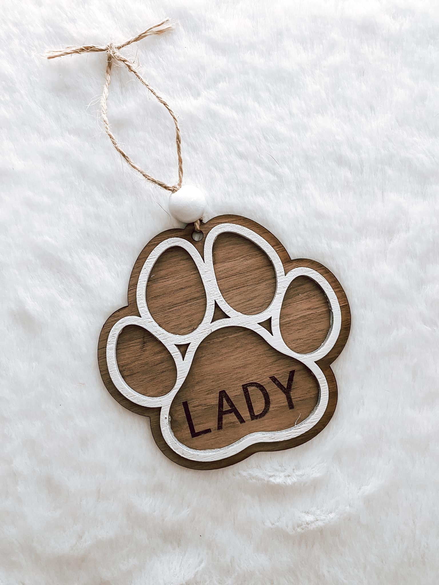 Laser cut and engraved paw print ornament with pet name